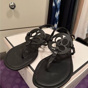 Coach Black Sandals with Thong Style and Circular Embellishment